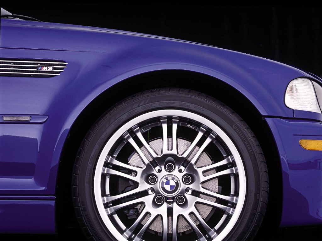 BMW M3 E46 Style 67 alloy wheel and cross-drilled brake rotor