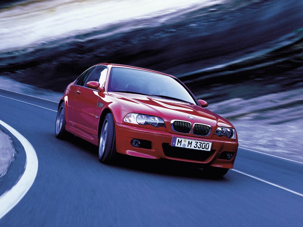 BMW M3 E46 Coupé Imola Red cornering dynamically